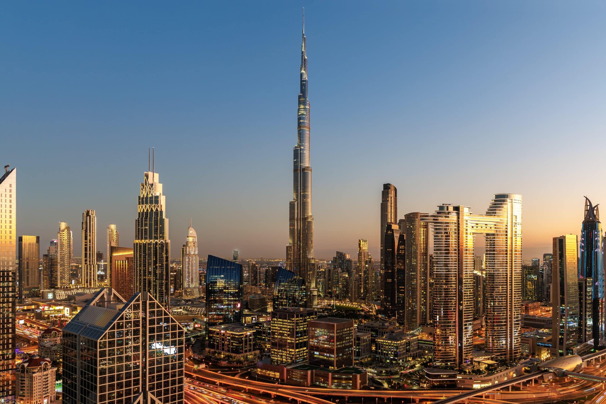 Downtown Dubai at dusk, the Burj Khalifa above Sheikh Zayed Road